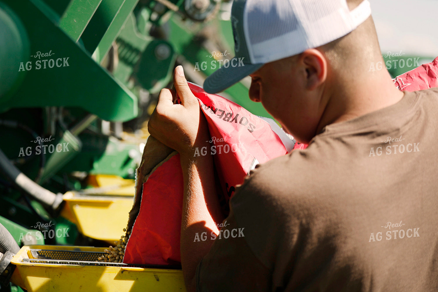 Loading Planter with Seed Bags 129087