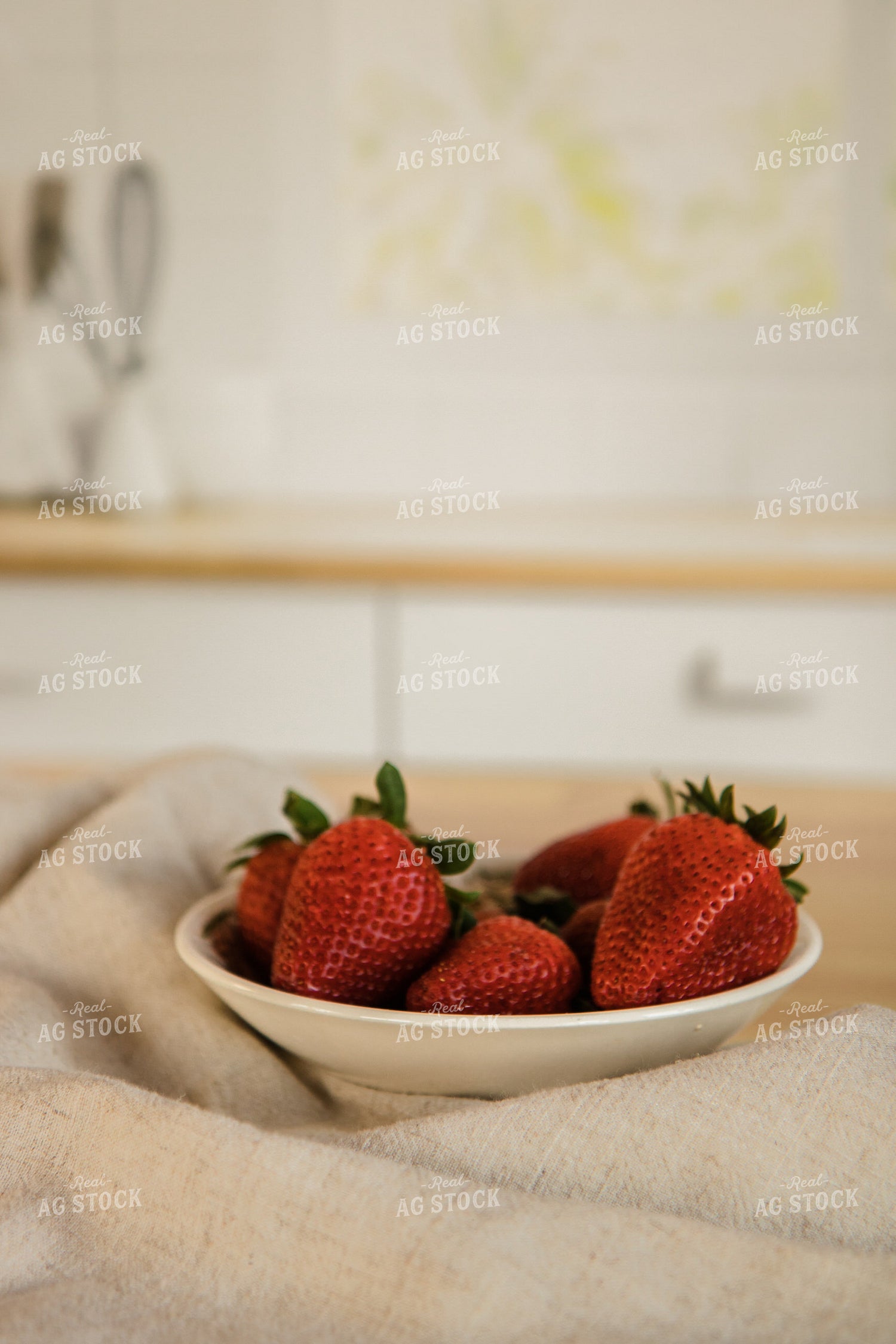 Strawberries in Bowl on Kitchen Countertop 67337