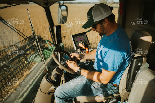 Farmer Operating Combine 7109