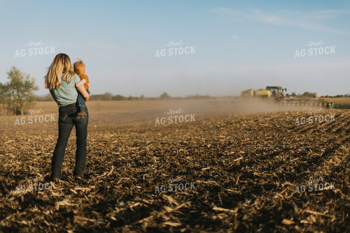 Farm Wife and Child Watch Tractor Plant 7686
