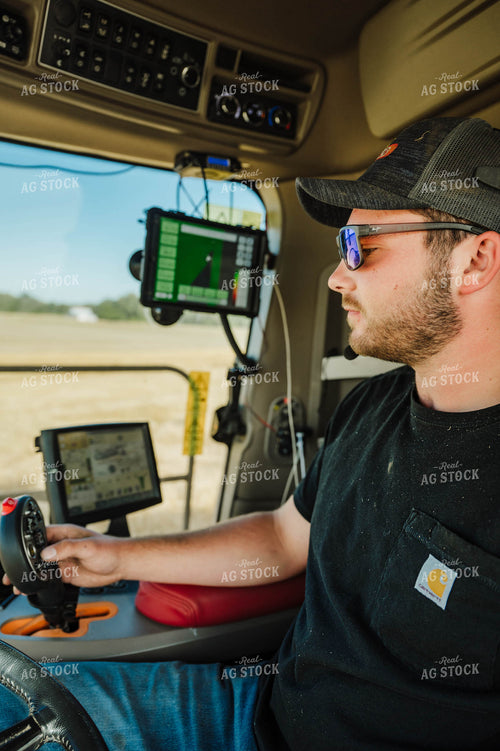 Farmer Driving Tractor 115223