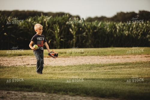 Farm Family Playing Catch Alongside Corn Field 4490