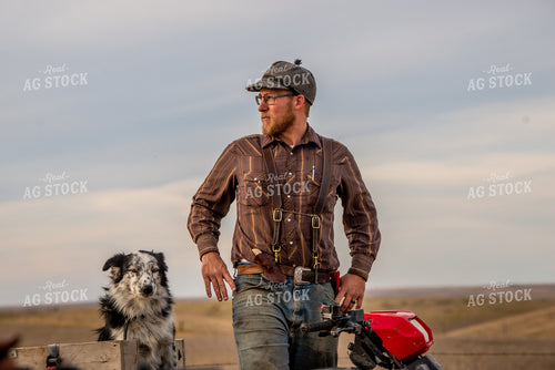 Rancher and Dog on Four Wheeler 299021