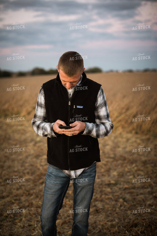 Farmer on Phone in Field 6852