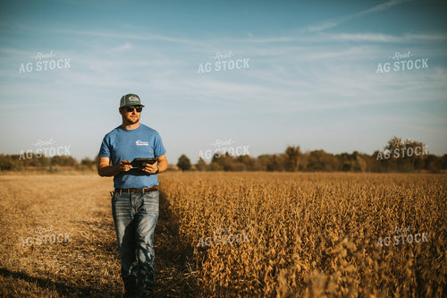 Farmer in Field with Tablet 7175
