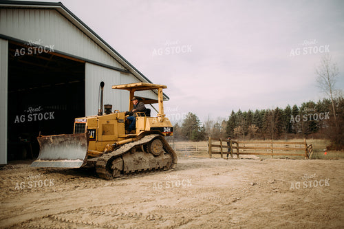 Farmer Running Bulldozer 169058