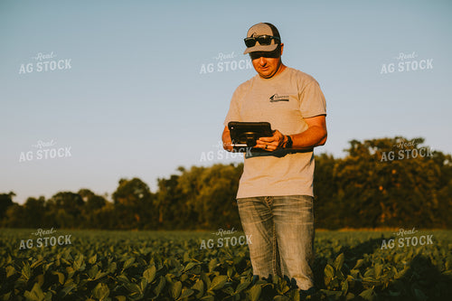 Farmer in Soybean Field with Tablet 6127