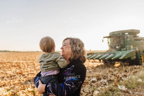 Farmer Holding Kid 115133