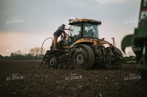 Farmer Walking Toward Planter Tractor with Farm Kid 5669