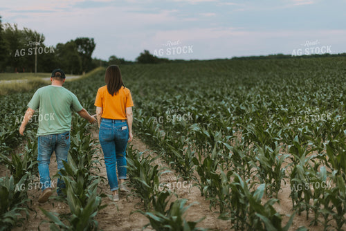 Farmers Scouting Corn Field 7834