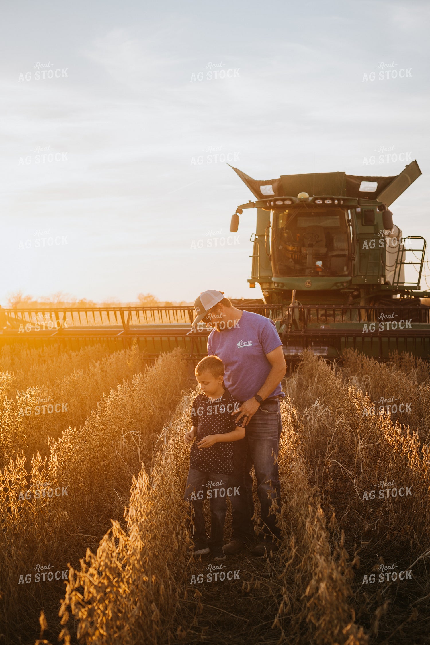 Farmer and Son in Soybean Field 6977
