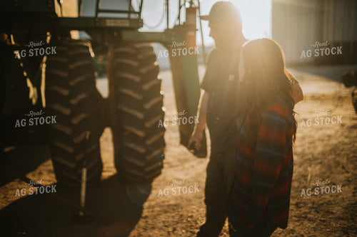 Farmer and Farm Wife Talking next to Combine 5051