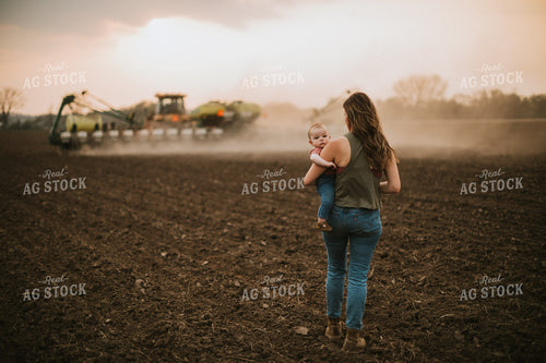 Farm Mom and Farm Kid Watching Planter Tractor 5700