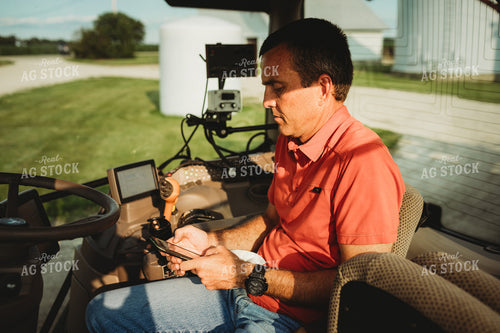 Farmer with Tractor Cab Monitors 4463
