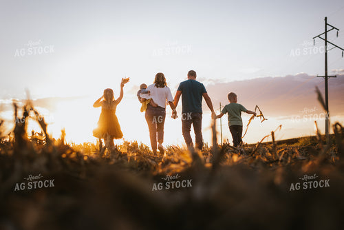 Farm Family Walking in Field 9383