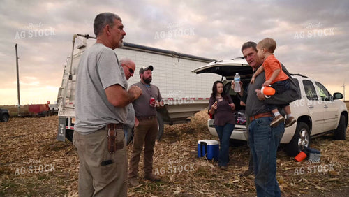 Family Enjoying Harvest Meal in the Field - 550