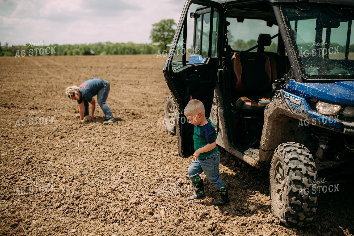 Farm Kid and Mom Picking Up Rocks 169095
