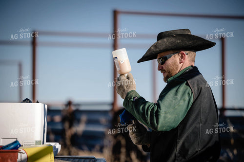 Rancher Preparing Cattle Vaccine 219054