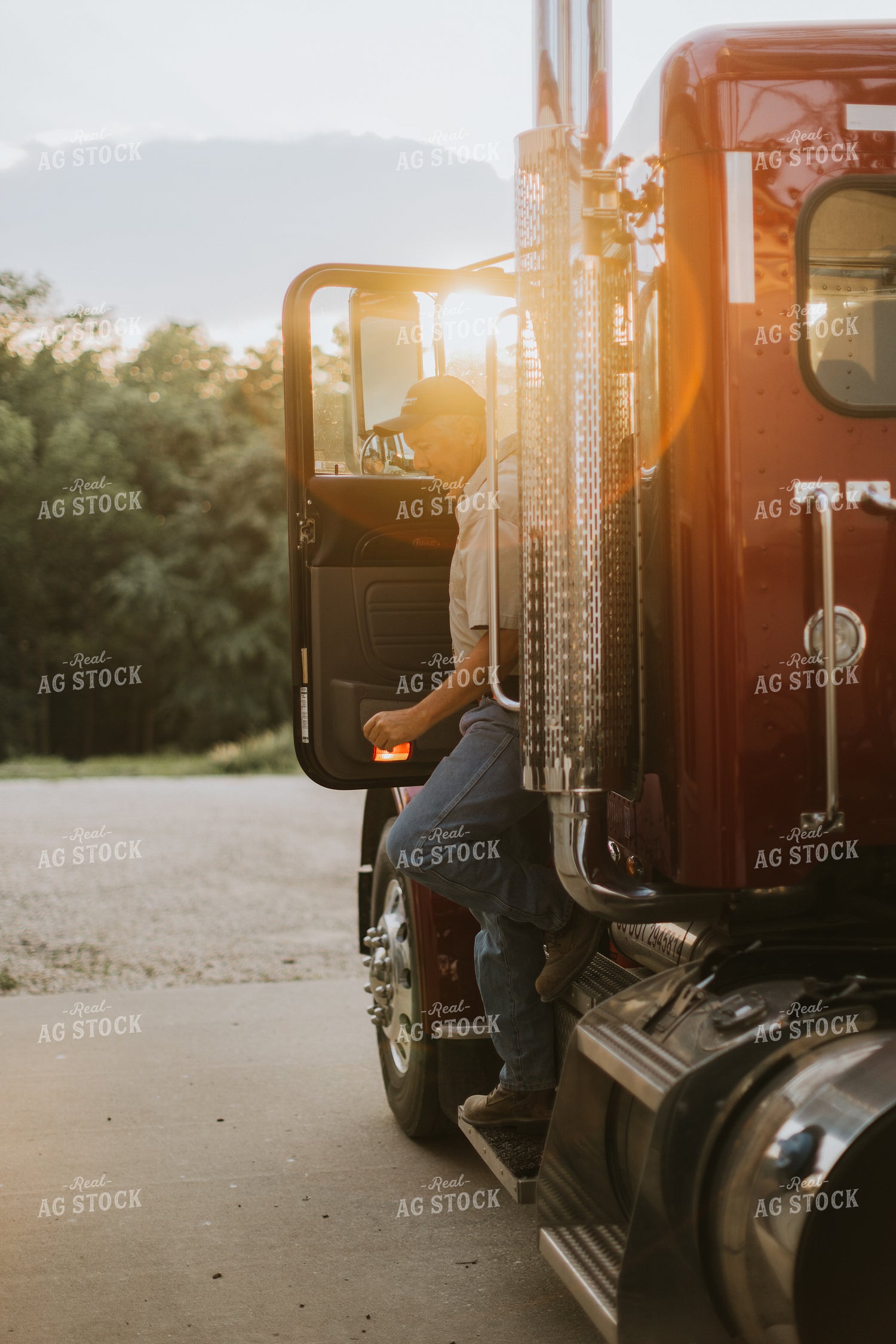 Farmer Climbing Out of Semi Truck 7787
