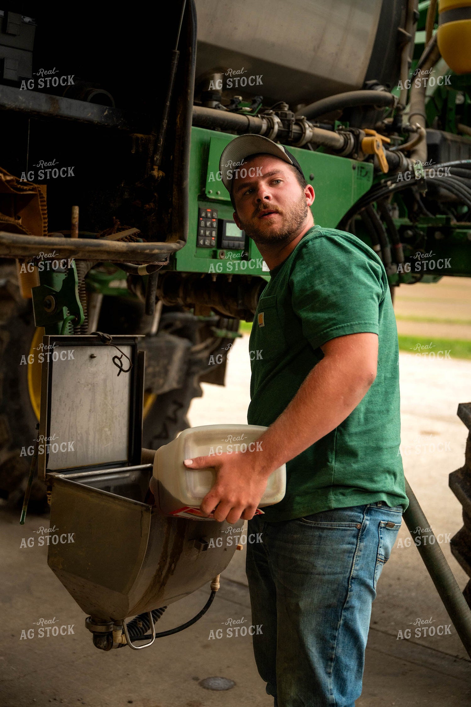 Farmer Filling Self-Propelled Sprayer 115744