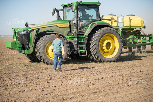 Farm Kid Walking up to Tractor 86042