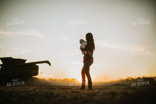 Farm Mom and Wife with Baby in Soybean Field with Combine 5110