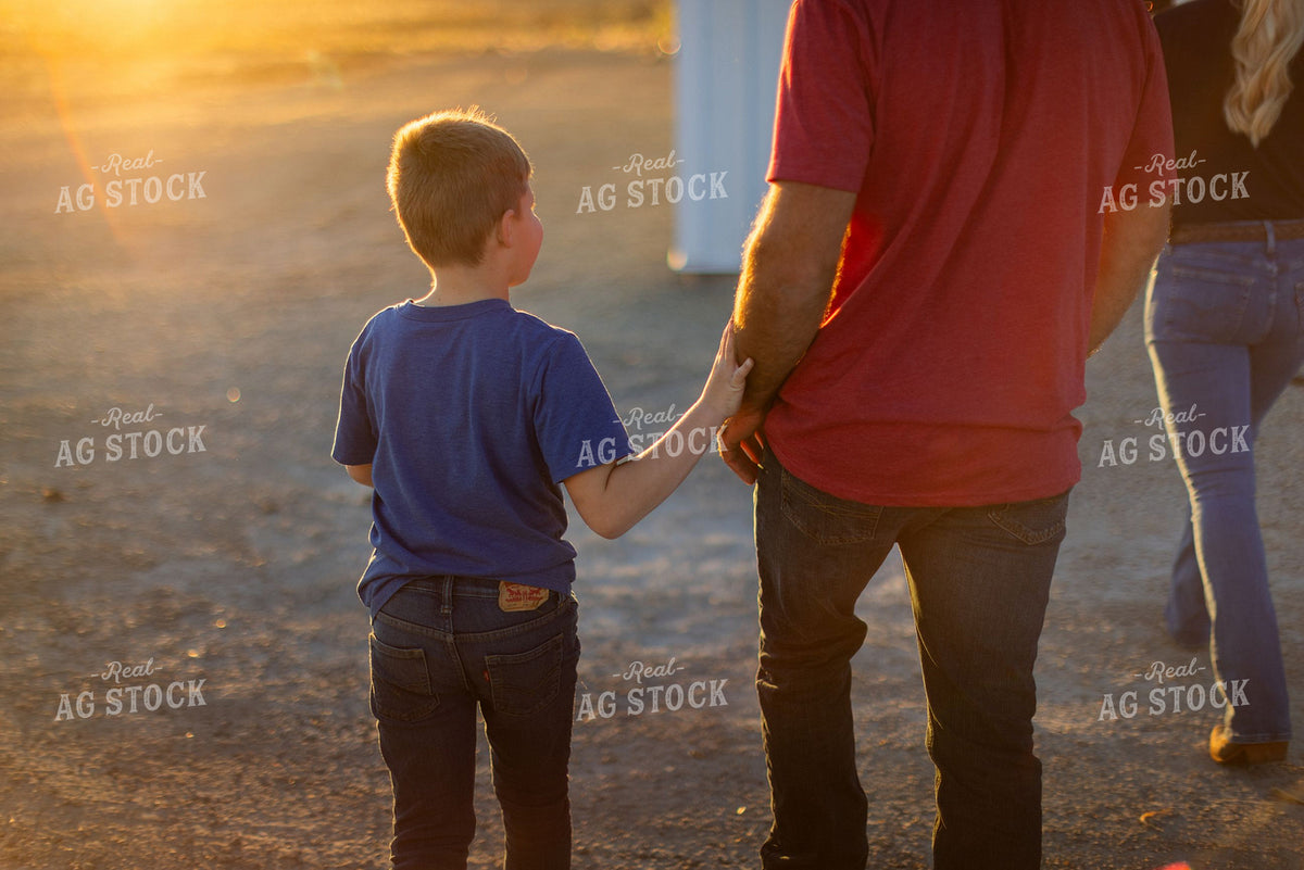 Farm Family Walking Together at Sunset 400012