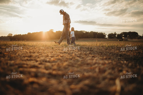 Farmer and Farm Kid Walking to Truck 4872