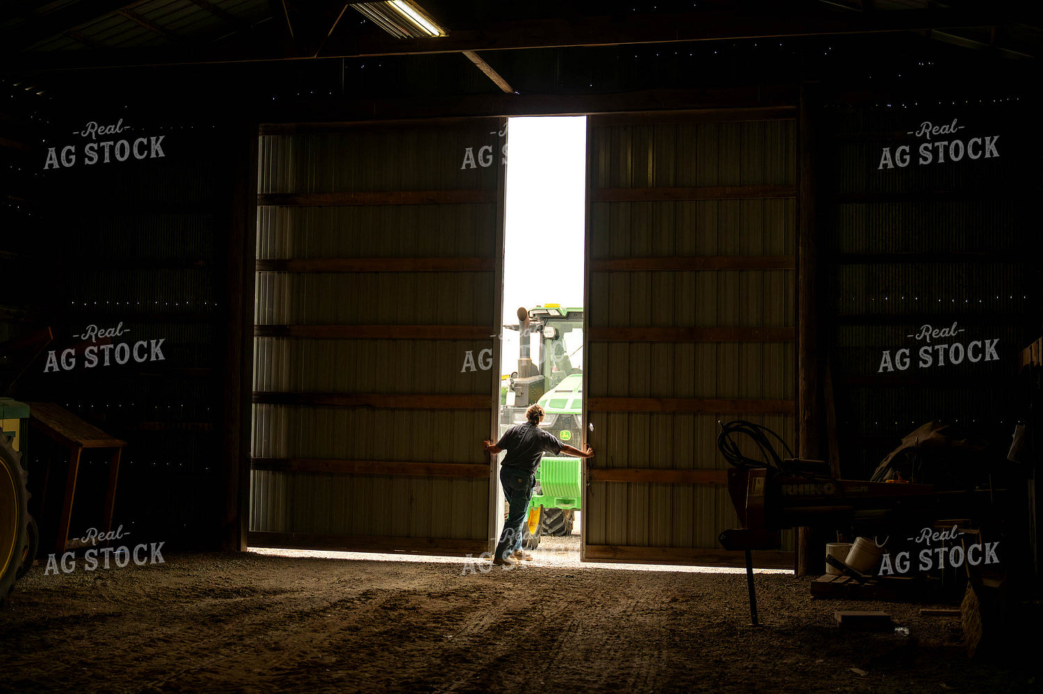 Female Farmer Opening Shed Doors 115709