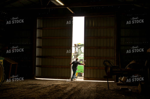 Female Farmer Opening Shed Doors 115709