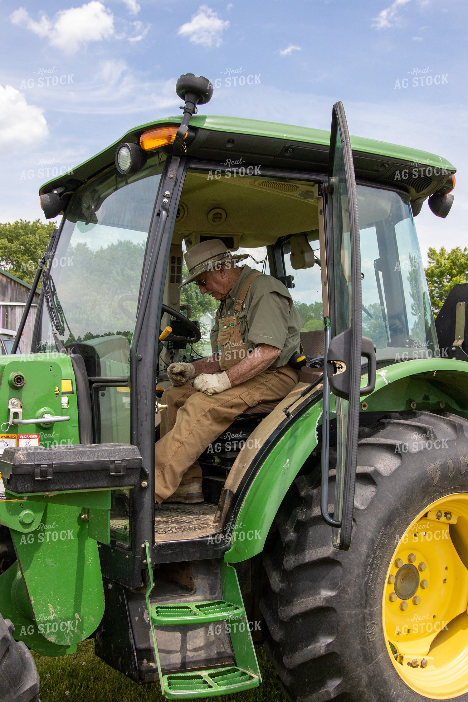 Farmer in Tractor 52160