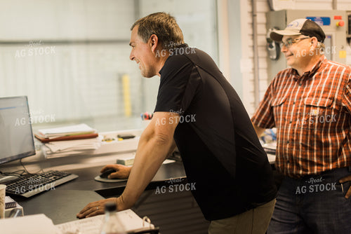 Retailer Working in Office 8063