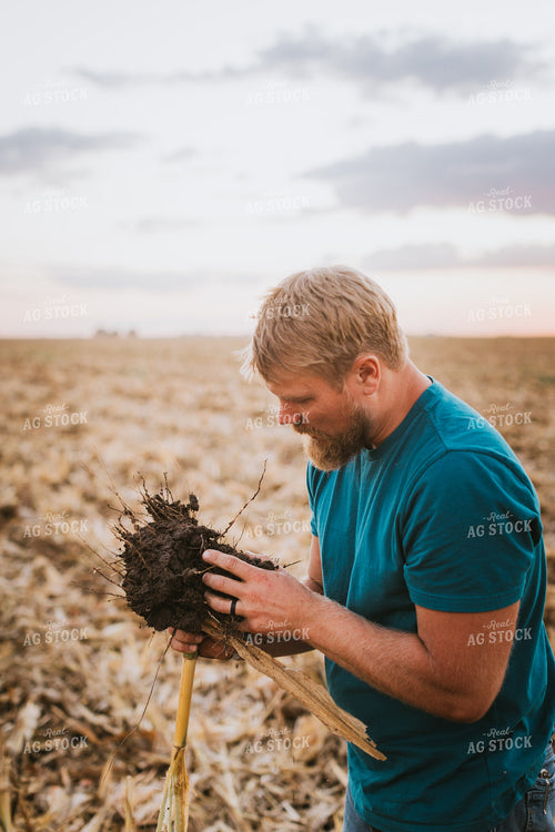 Farmer Checking Root Ball 9406