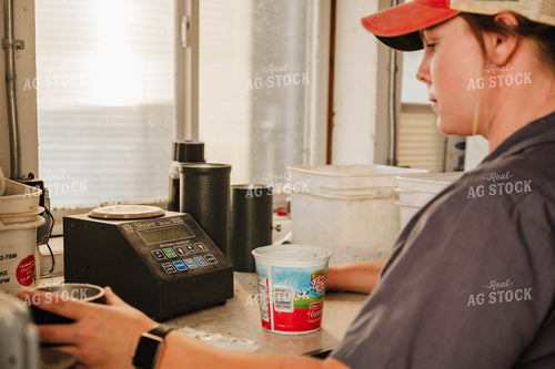 Female Farmer Testing Moisture 115261