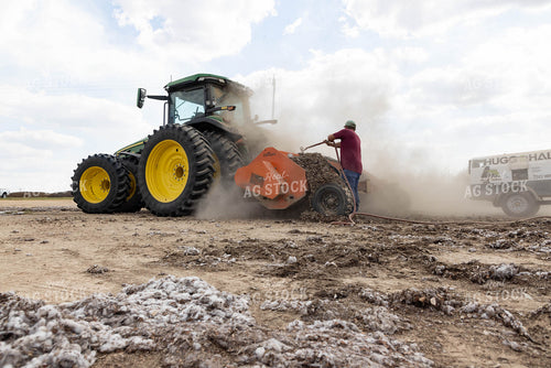 Farmer Blowing Cotton off Machinery 79742