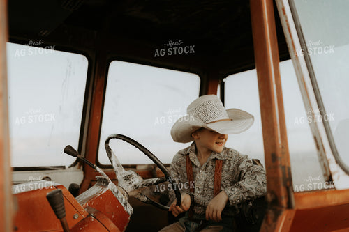 Farm Kid in Tractor Cab 61221