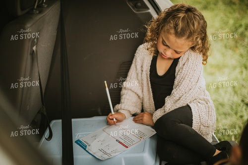 Farm Kid Doing Homework 6663