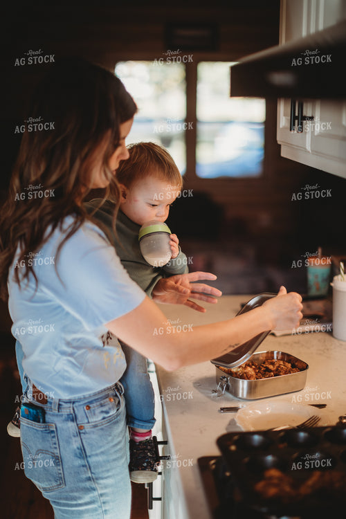 Farm Mom and Son Getting Food 6811