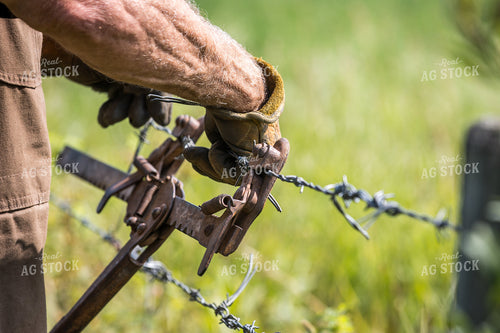 Farmer Fixing Fence 138085