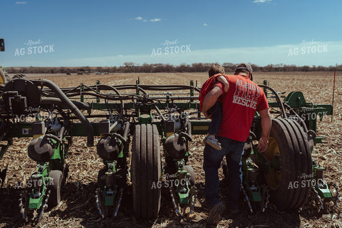 Farm Kid Helps with Test Plot 196106