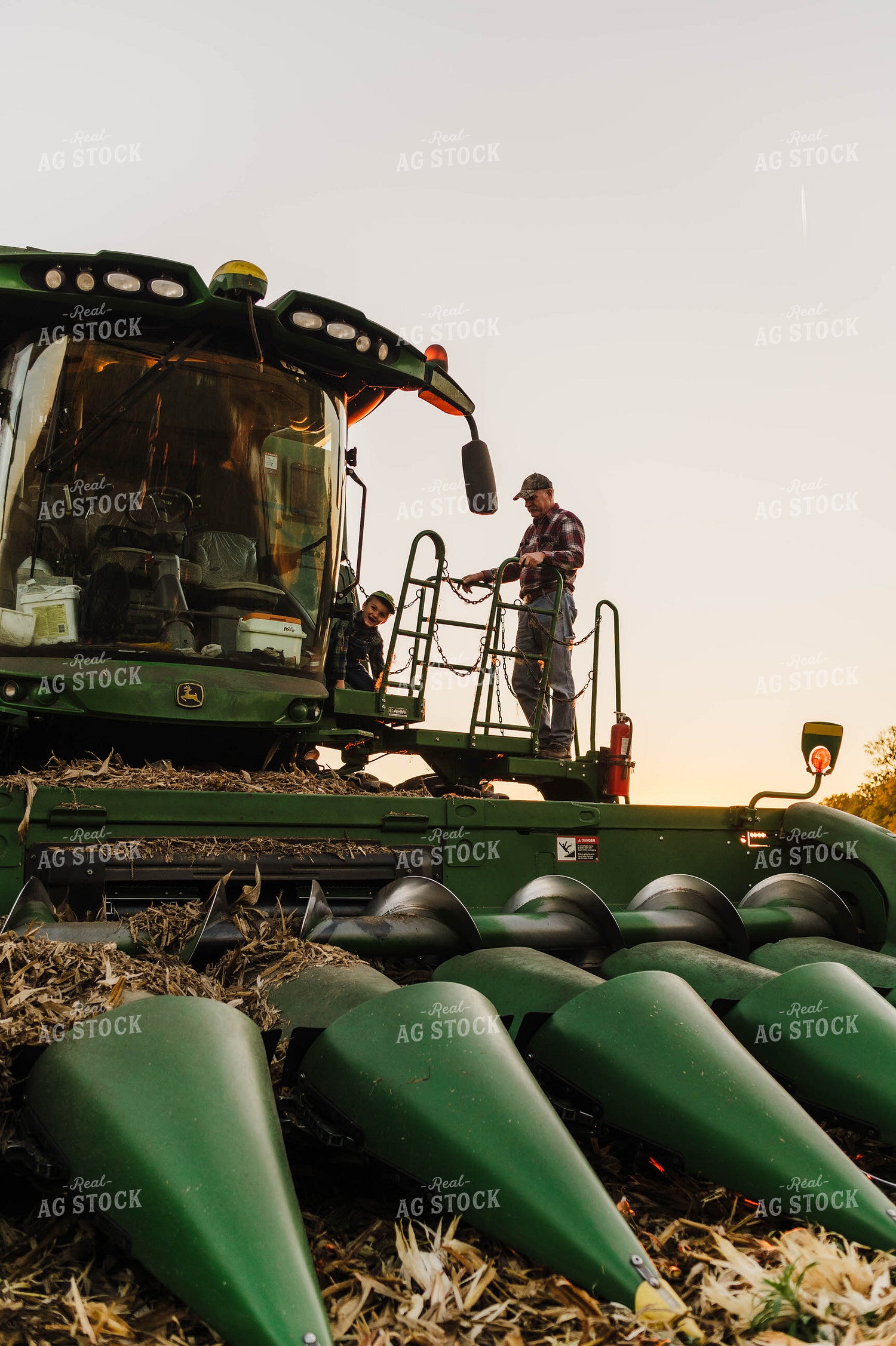Farm Family Climbing into Tractor 115139