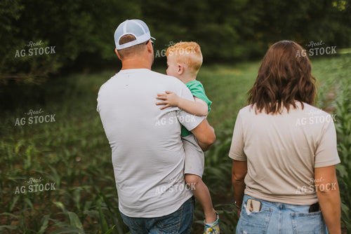 Farm Family Checking Corn 8739