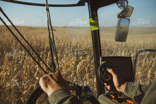 Farmer Driving Combine 67974