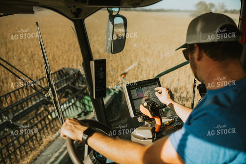 Farmer Operating Combine 7107
