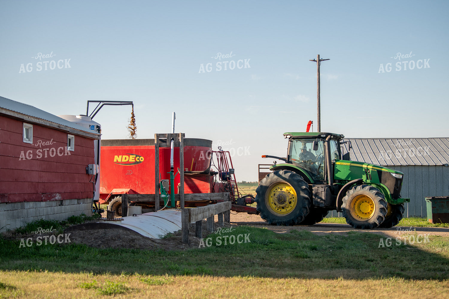 Filling Feed Wagon with Liquid Supplement 212059