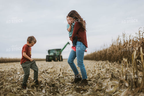 Female Farmer and Kids Walking Away from Tractor 8611
