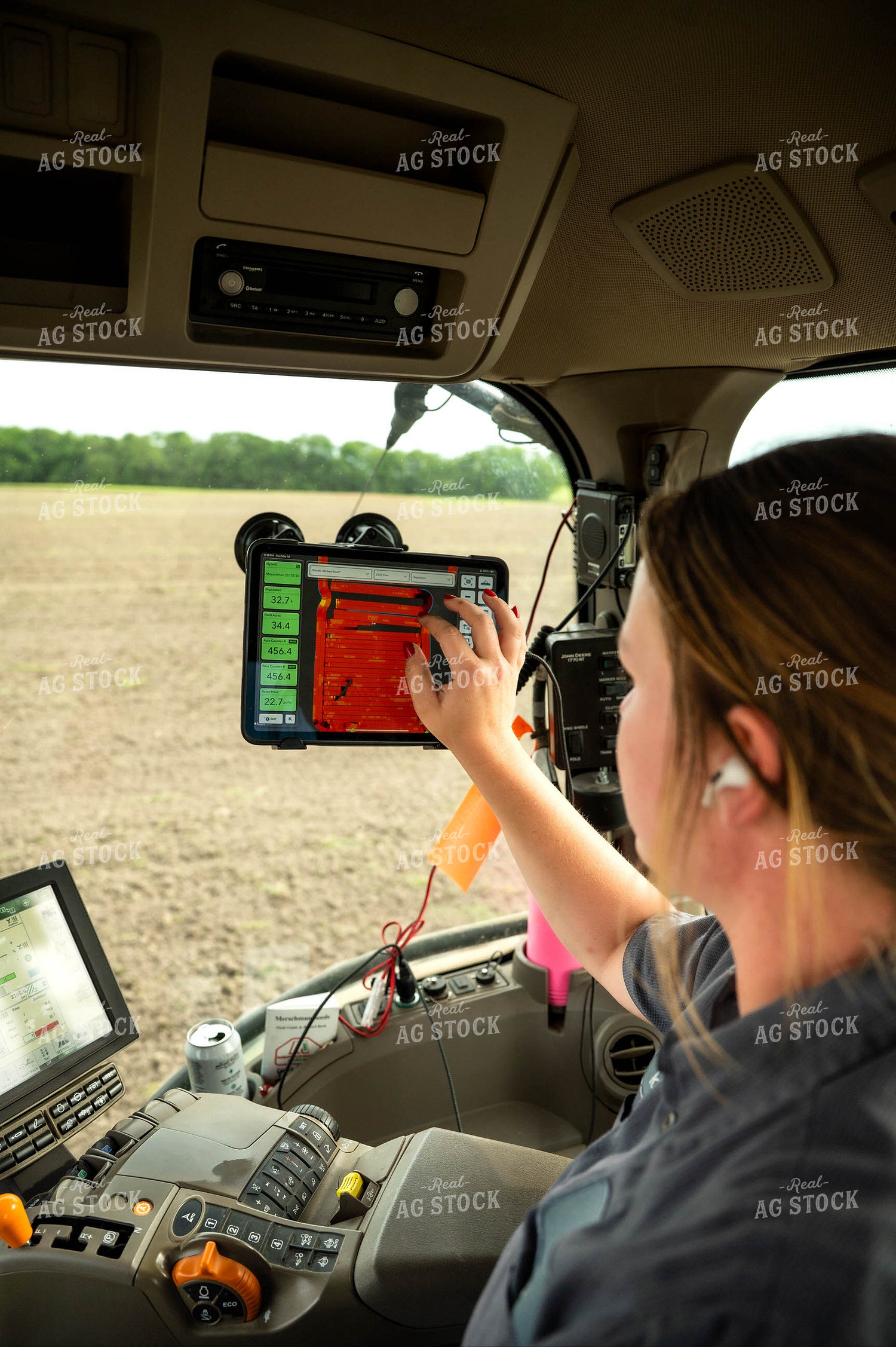 Female Farmer in Tractor Cab 115667