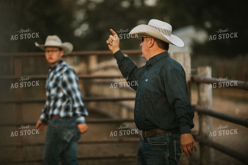 Ranchers in Cattle Pasture 6494