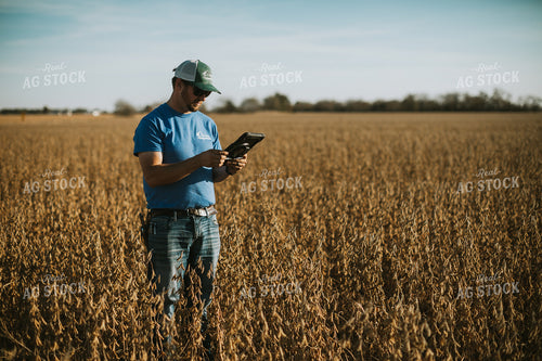 Farmer in Field with Tablet 7168