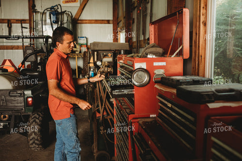 Farmer Getting Tools inside Farm Shop 4512
